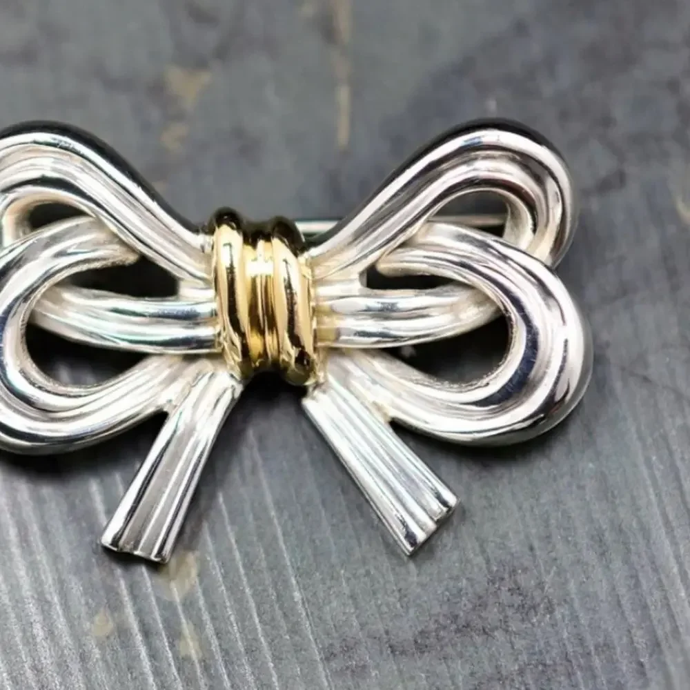 Authentic  Tiffany & Co. Sterling Silver and 18k Yellow Gold Ribbon Bow brooch